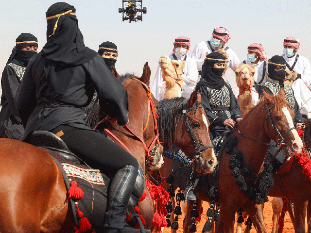 saudi women attend the sixth edition of the king abdulaziz camel festival in the rumah region some 161km east of the capital riyadh on saturday photo afp