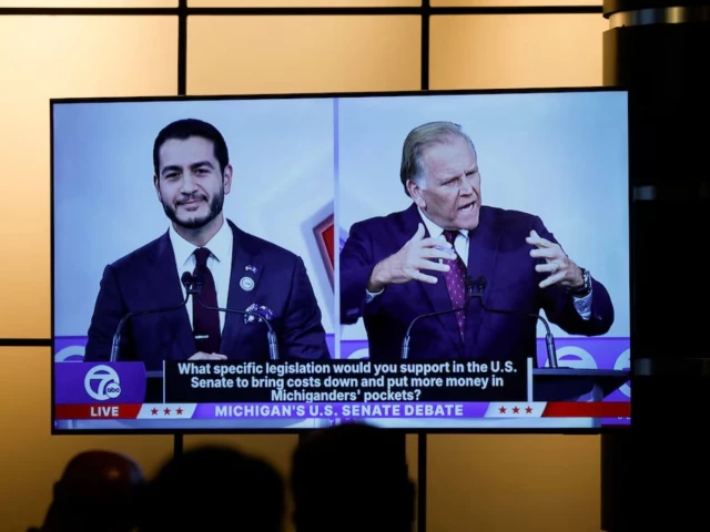 democratic nominee for us senate abdul el sayed and republican nominee for us senate mike rogers are seen on a screen in the media room during their us senate debate in southfield michigan us october 21 2026 reuters democratic nominee for us senate abdul el sayed and republican nominee for us senate mike rogers are seen on a screen in the media room during their us senate debate in southfield michigan us october 21 2026 reuters