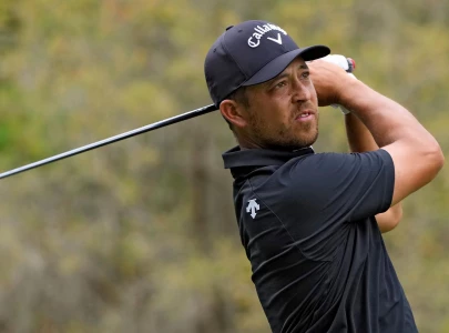 schauffele grabs one stroke lead over clark at the players