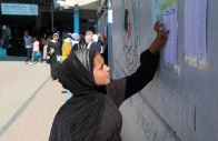 displaced palestinian student samar abu salmi 15 reads a list of names displayed in a school in khan younis in the southern gaza strip september 20 2026 photo reuters