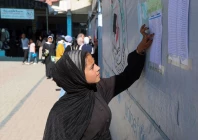 displaced palestinian student samar abu salmi 15 reads a list of names displayed in a school in khan younis in the southern gaza strip september 20 2026 photo reuters