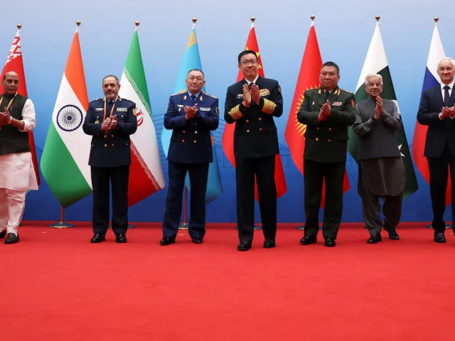 chinese defence minister dong jun india s defence minister rajnath singh iran s defence minister aziz nasirzadeh kazakhstan s defence minister dauren kosanov kyrgyzstan s defence minister ruslan mukambetov pakistan s defence minister khawaja asif and russia s defence minister andrei belousov applaud following a group photo before the shanghai cooperation organisation sco defence ministers meeting in qingdao shandong province china june 26 2025 photo reuters chinese defence minister dong jun india s defence minister rajnath singh iran s defence minister aziz nasirzadeh kazakhstan s defence minister dauren kosanov kyrgyzstan s defence minister ruslan mukambetov pakistan s defence minister khawaja asif and russia s defence minister andrei belousov applaud following a group photo before the shanghai cooperation organisation sco defence ministers meeting in qingdao shandong province china june 26 2025 photo reuters