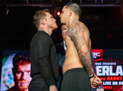 watch canelo alvarez and edgar berlanga separated by security during tense face off