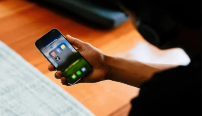 a high school student poses with his mobile phone showing his social media applications in melbourne australia november 28 2024 source reuters