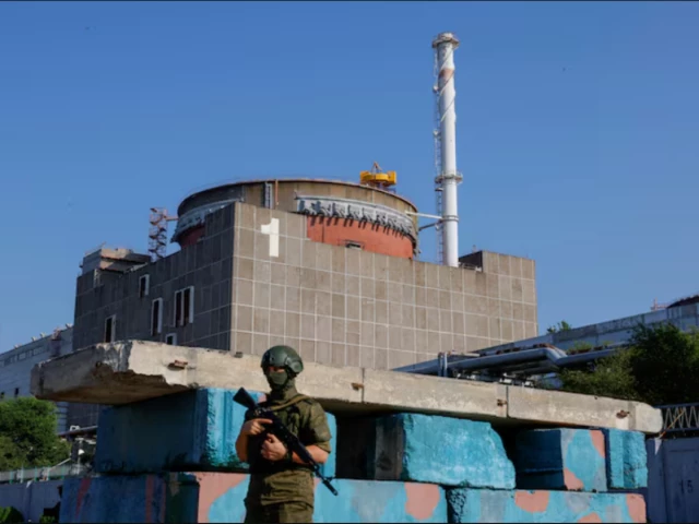 a russian service member stands guard at a checkpoint near the zaporizhzhia nuclear power plant before the arrival of the international atomic energy agency iaea expert mission in the course of russia ukraine conflict outside enerhodar in the zaporizhzhia region russian controlled ukraine source reuters a russian service member stands guard at a checkpoint near the zaporizhzhia nuclear power plant before the arrival of the international atomic energy agency iaea expert mission in the course of russia ukraine conflict outside enerhodar in the zaporizhzhia region russian controlled ukraine source reuters