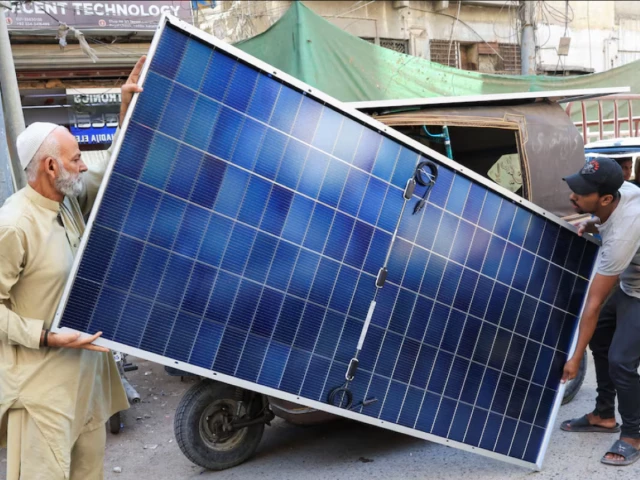 men load solar panels on a rickshaw at a market in karachi source reuters men load solar panels on a rickshaw at a market in karachi source reuters