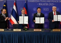 malaysia s prime minister anwar ibrahim applauds as cambodia s prime minister hun manet thailand s prime minister anutin charnvirakul and u s president donald trump hold up documents during the ceremonial signing of a ceasefire agreement between thailand and cambodia source reuters