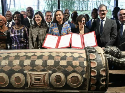 france repatriates stolen colonial era talking drum to ivory coast