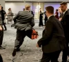 a security official runs with a bag as a shooter opens fire during the annual white house correspondents association dinner in washington d c u s april 25 2026 photo reuters