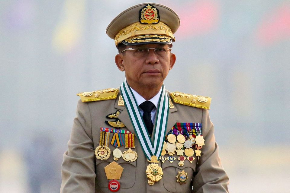 myanmar s junta chief senior general min aung hlaing who ousted the elected government in a coup presides at an army parade on armed forces day in naypyitaw myanmar march 27 2021 reuters