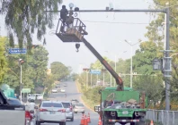 workers install cctv cameras on a pole at aabpara chowk in the federal capital as part of enhanced security measures being taken ahead of the multiple long marches announced for the weekend photo online