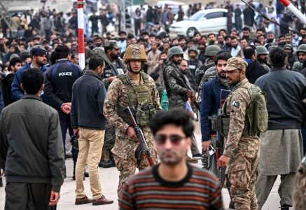 security personnel stand guard outside a mosque following an explosion in islamabad on february 6 2026 photo afp