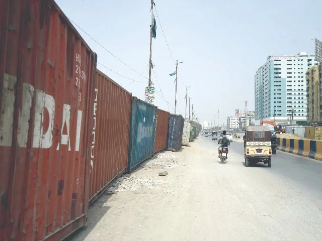 police have placed containers on ma jinnah road to secure the procession of 12th rabiul awwal photo ppi