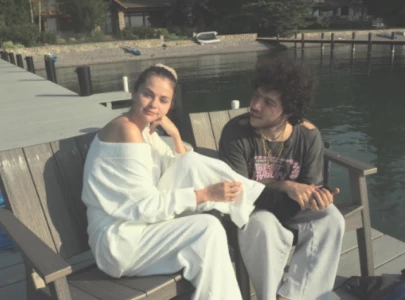 selena gomez and benny blanco relax by lakeside after bachelor and bachelorette party