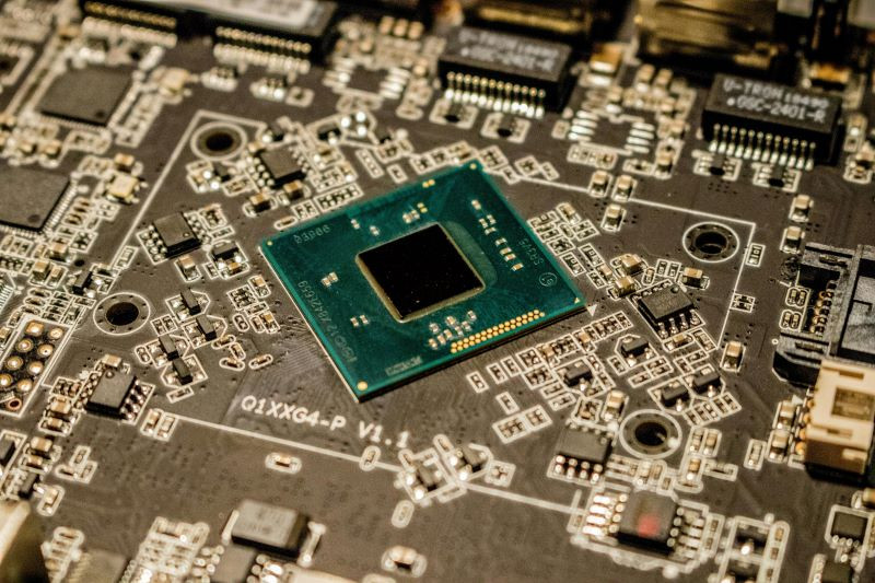 a microchip with other components photo pexels
