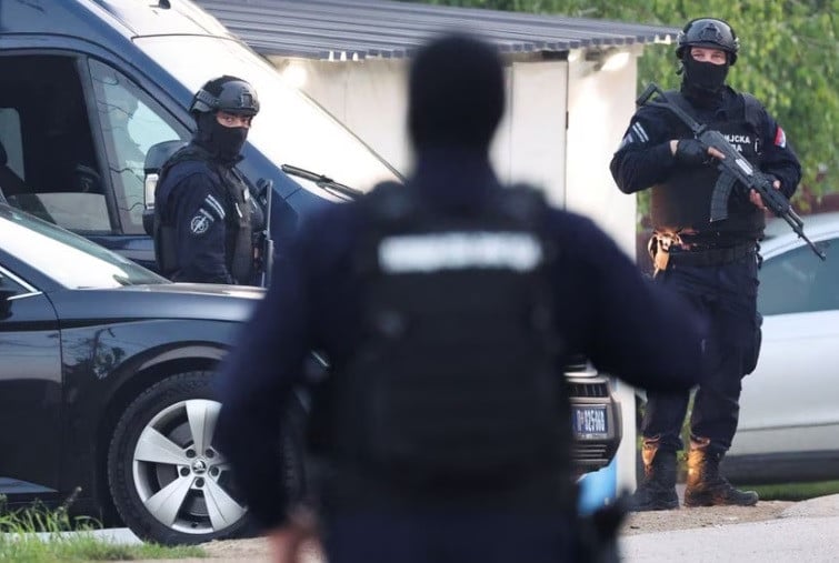 security personnel operate in the aftermath of a shooting in dubona serbia may 5 2023 reuters antonio bronic