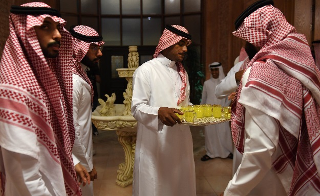 Saudis attend the wedding of a friend at his home in the Red Sea resort of Jeddah. PHOTO: AFP 