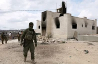 members of israeli security forces and journalists walk in the estate of palestinians mahmod tubasi 60 and his wife aedah 51 which they say was attacked by israeli settlers in jalud in the israeli occupied west bank september 29 2026 reuters