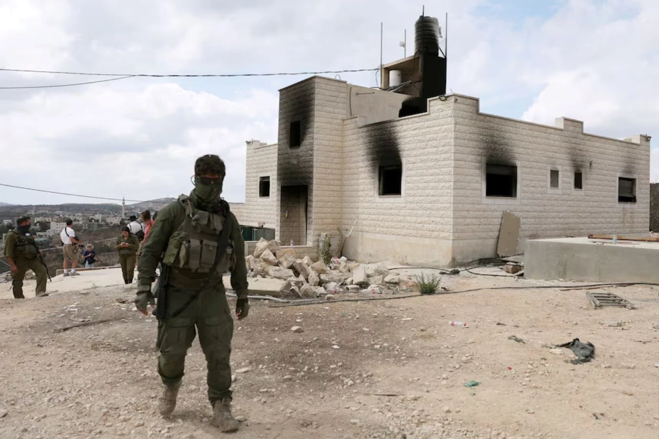 Israeli occupiers attack olive pickers in central West Bank, torch 3 vehicles