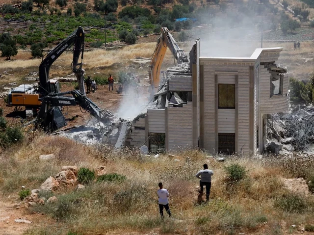 palestinians observe as heavy machinery demolishes a palestinian house near hebron in the israeli occupied west bank june 8 2026 reuters palestinians observe as heavy machinery demolishes a palestinian house near hebron in the israeli occupied west bank june 8 2026 reuters