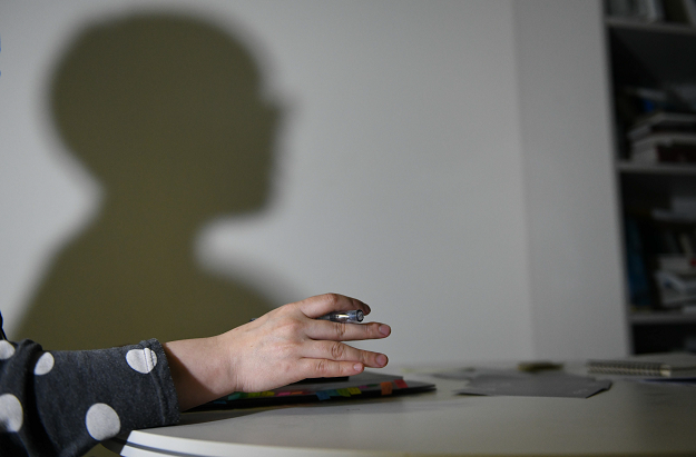 Shadow of a South Korean woman who asked to be identified only as 'D' for fear of her personal safety. PHOTO: AFP. 