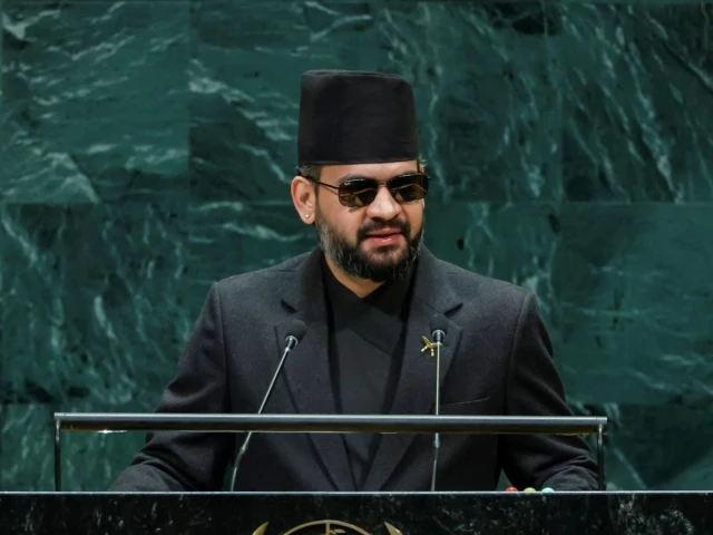 Nepal PM says floods 'a warning to the world' about climate change