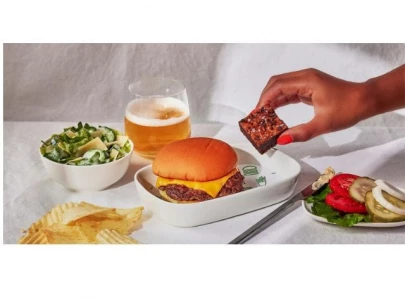 delta partners with shake shack to serve signature cheeseburgers on flights
