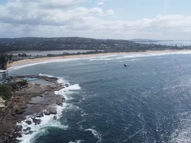 a drone view of long reef beach following an incident where a surfer died after being attacked by a large shark in dee why near sydney australia september 6 2025 in this screen grab obtained from social media video photo reuters a drone view of long reef beach following an incident where a surfer died after being attacked by a large shark in dee why near sydney australia september 6 2025 in this screen grab obtained from social media video photo reuters