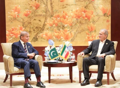 pakistan iran vow deeper cooperation on sco summit sidelines pakistan iran vow deeper cooperation on sco summit sidelines