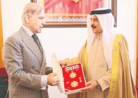 king of bahrain hamad bin isa al khalifa confers the order of bahrain upon prime minister shehbaz sharif in manama photo inp