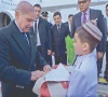 prime minister shehbaz sharif is greeted with local customs on arrival in ashgabat turkmenistan photo online