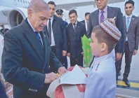 prime minister shehbaz sharif is greeted with local customs on arrival in ashgabat turkmenistan photo online