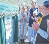 prime minister shehbaz sharif wearing traditional attire prays after unveiling the plaque for a branch of the danish school in chitral photo inp
