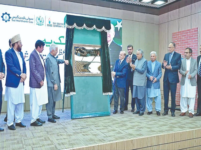 prime minister shehbaz sharif unveils a plaque at a ceremony in islamabad marking the restoration of domestic rlng connections photo app