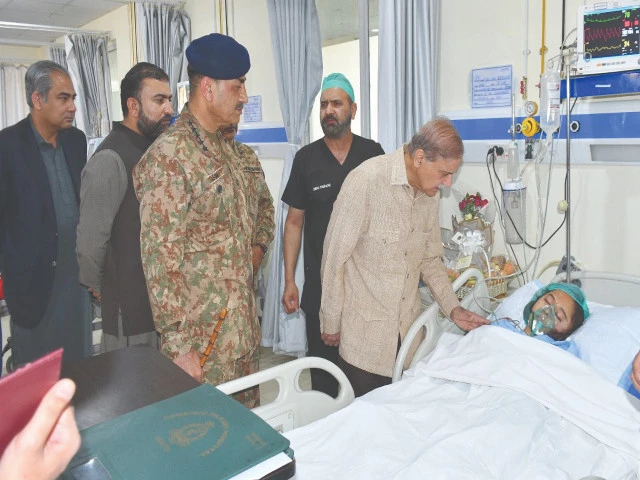 prime minister shehbaz sharif visits a hospital in quetta to meet children injured in the school bus attack in khuzdar photo express prime minister shehbaz sharif visits a hospital in quetta to meet children injured in the school bus attack in khuzdar photo express