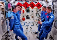 this image captured at beijing aerospace control center on nov 1 2025 shows the crew of shenzhou 20 and shenzhou 21 spaceships talking with each other photo xinhua