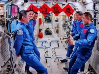 this image captured at beijing aerospace control center on nov 1 2025 shows the crew of shenzhou 20 and shenzhou 21 spaceships talking with each other photo xinhua