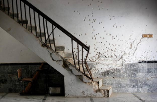 A general view of a wall with shrapnel-scars, which witnesses said was damaged in a suicide blast on January 2015, in a Shia mosque in Shikarpur. PHOTO: REUTERS