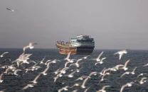 iran reimposes control over strait of hormuz as ships report gunfire