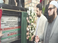 afridi inaugurates 96 flats in peshawar photo afp