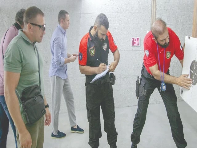 mid echoes of discipline and focus marksmen take aim during a shooting competition held at the special security unit ssu headquarters the contest showcased exceptional skill and control drawing top shooters from around the world photo nni