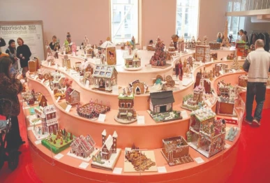 people visit the gingerbread house competition at the museum of architecture and design in stockholm sweden photo reuters