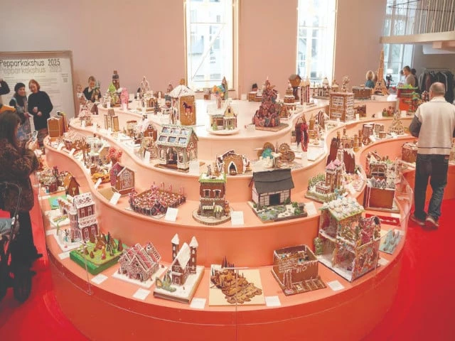 people visit the gingerbread house competition at the museum of architecture and design in stockholm sweden photo reuters