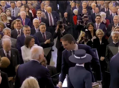 watch barron trump shakes biden s hand at inauguration