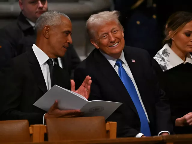 trump and obama s rare meeting at carter s funeral analysed by lip readers