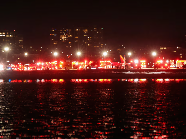 emergency vehicles converge on the crash site after american eagle flight 5342 collided with a helicopter near reagan national airport and plunged into the potomac river reuters