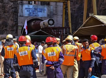 rescue teams race to save eight workers stuck in collapsed indian tunnel