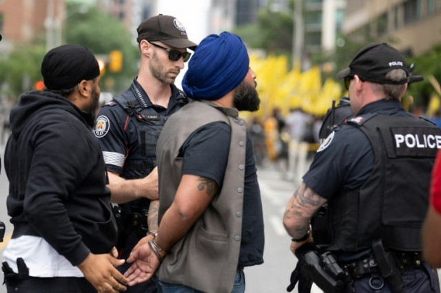 police arrest a sikh protestor during a demonstration in front of the indian consulate in toronto on july 8 2023 photo afp police arrest a sikh protestor during a demonstration in front of the indian consulate in toronto on july 8 2023 photo afp