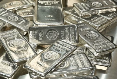 gold slips silver hits record high