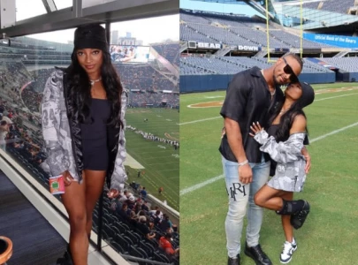 simone biles slammed by nfl fans for wearing green bay packers jacket to chicago bears game simone biles slammed by nfl fans for wearing green bay packers jacket to chicago bears game